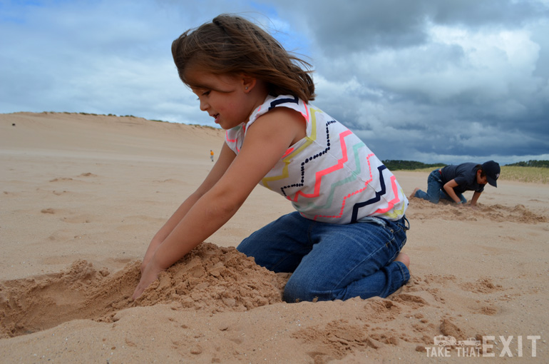 Digging-sand-Sleeping-Bear-Dunes-sp