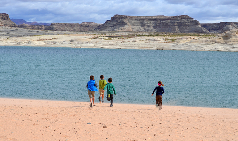 Playing-Lone-Rock-Beach-Powell